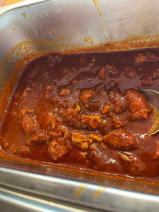 Taco de Chicharrón Prensado en Guajillo.